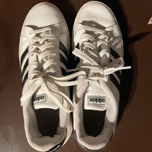 white and black adidas shoes